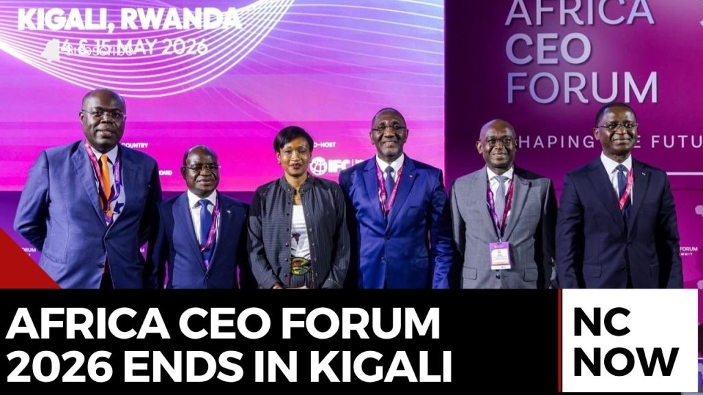Six executives in suits pose on stage at the Africa CEO Forum in Kigali, Rwanda, with a purple backdrop showing Kigali, Rwanda and Africa CEO Forum.