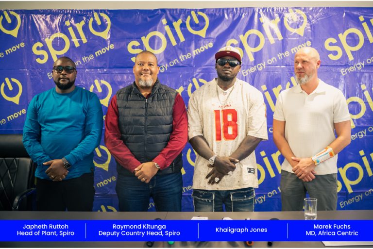 Four men pose in front of a blue Spiro backdrop; names shown: Japheth Ruttoh, Raymond Kitunga, Khaligraph Jones, Marek Fuchs.